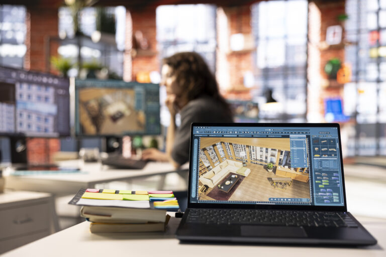 Woman uses architectural software on her PC to create a detailed 3D render