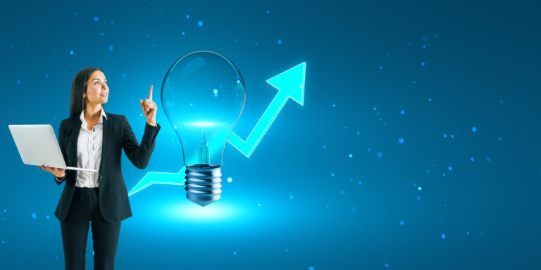 Businesswoman with laptop pointing at lightbulb and growth arrow on blue background