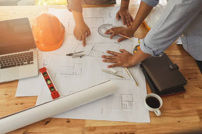 engineer-architect-team-meeting-discussing-project-plan